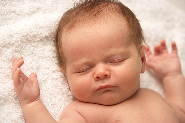 bigstock-Close-Up-Of-Baby-Sleeping-On-T-13913654.jpg